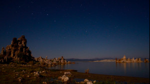 The Big Dipper sinks in the sky with the handle sweeping out a larger circle than the bowl of the asterism.